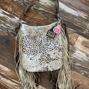 HCC Mini Bagpack only. Wallet is listed separately but you can bundle.